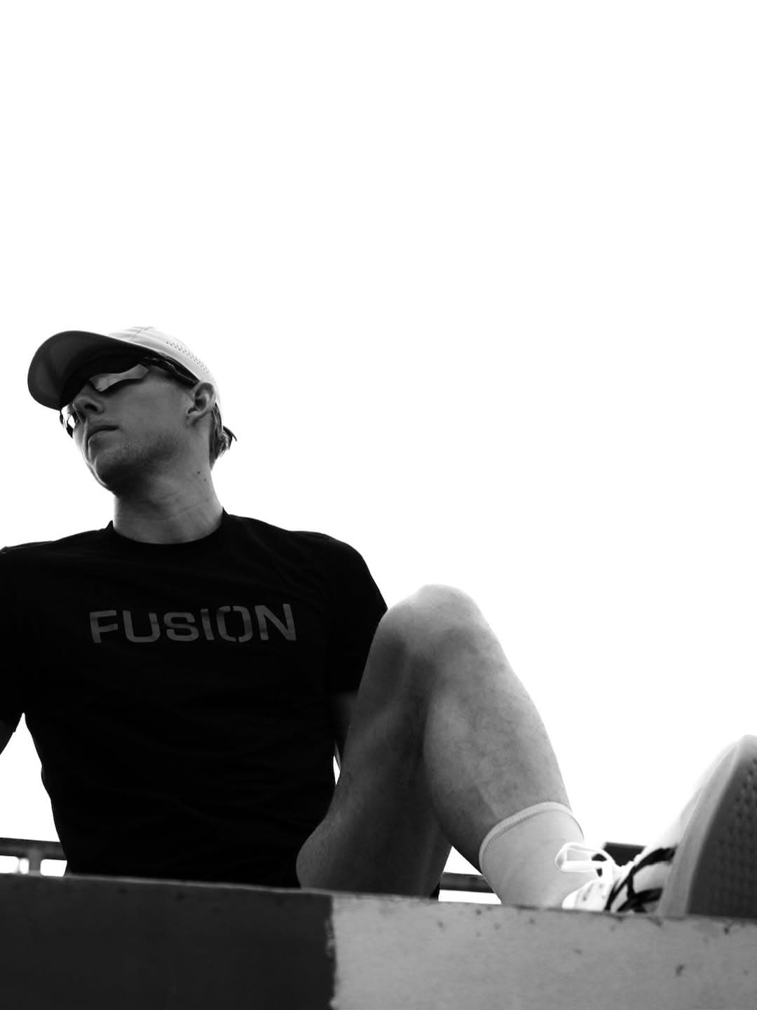 Chase pulling on his race-day USA tri-suit before the start.